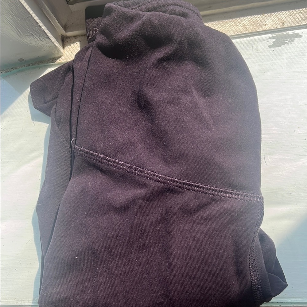 Very dark purple yoga leggings
